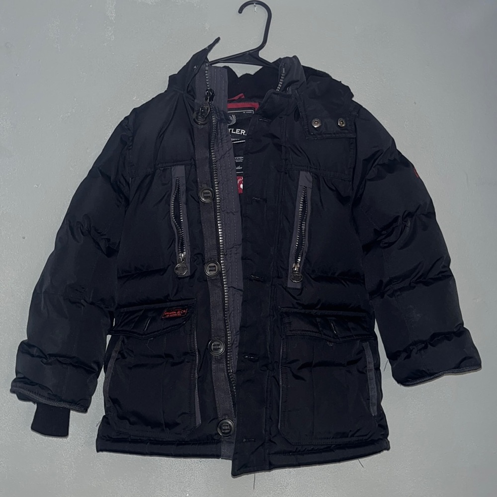 Heavy winter jacket. Boys size 7 like new
